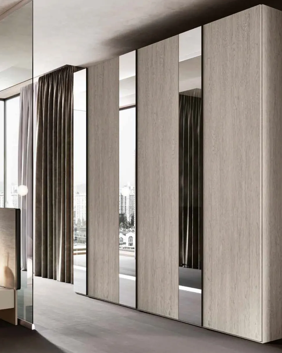 Armadio moderno con inserti a specchio e maniglia a gola 6 ante battenti disponibile in vari colori