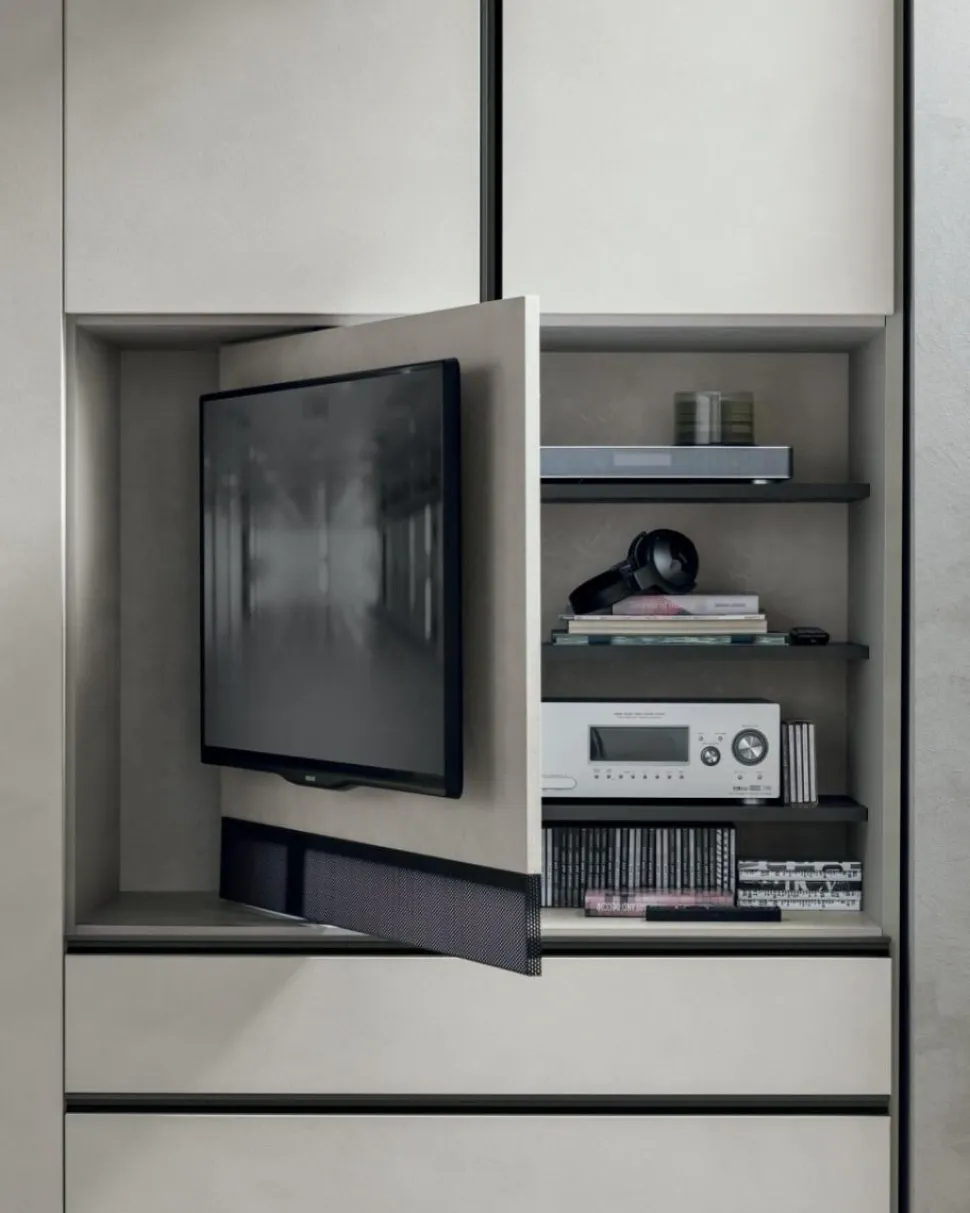 Armadio modulare componibile con vano TV girevole ante battenti e cassetti con maniglia a tutta altezza integrata disponibile in vari colori