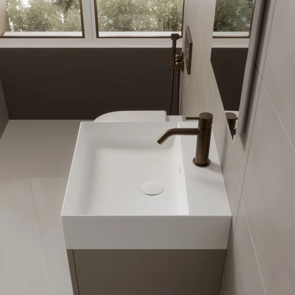 Bagno monoblocco sospeso 2 cassettoni e lavabo decentrato in ocritech disponibile in vari colori