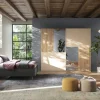 Camera matrimoniale con armadio scorrevole Enea linea Chèrie in finitura Cashmere e Rovere Cadiz