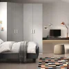Cameretta con Cabina armadio angolare e scrivania sospesa finitura Grigio Gesso