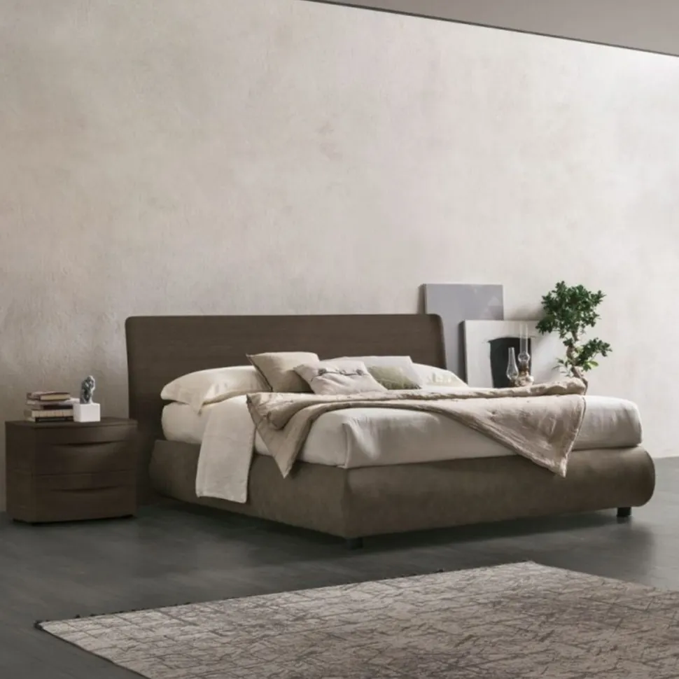 Letto contenitore con testiera curva e giroletto imbottito matrimoniale Ronald disponibile in 2 misure e vari colori