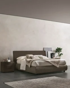 Letto contenitore con testiera curva e giroletto imbottito matrimoniale Ronald disponibile in 2 misure e vari colori