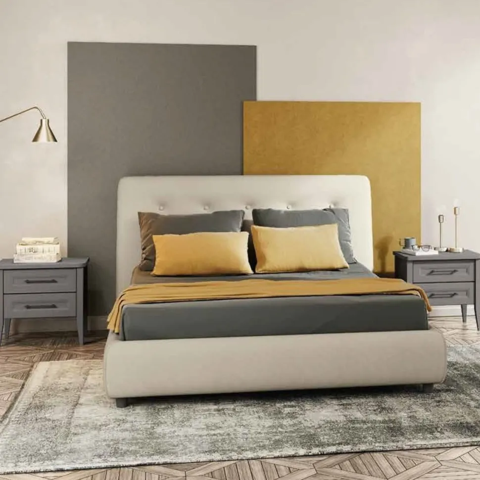 Letto matrimoniale imbottito Kilt linea Ginevra disponibile in vari colori