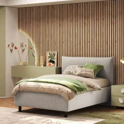Letto una piazza e mezza in tessuto imbottito con vano contenitore disponibile in 5 colori