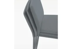 Sedia imbottita impilabile interamente rivestita in tessuto Nizza disponibile in 6 colori