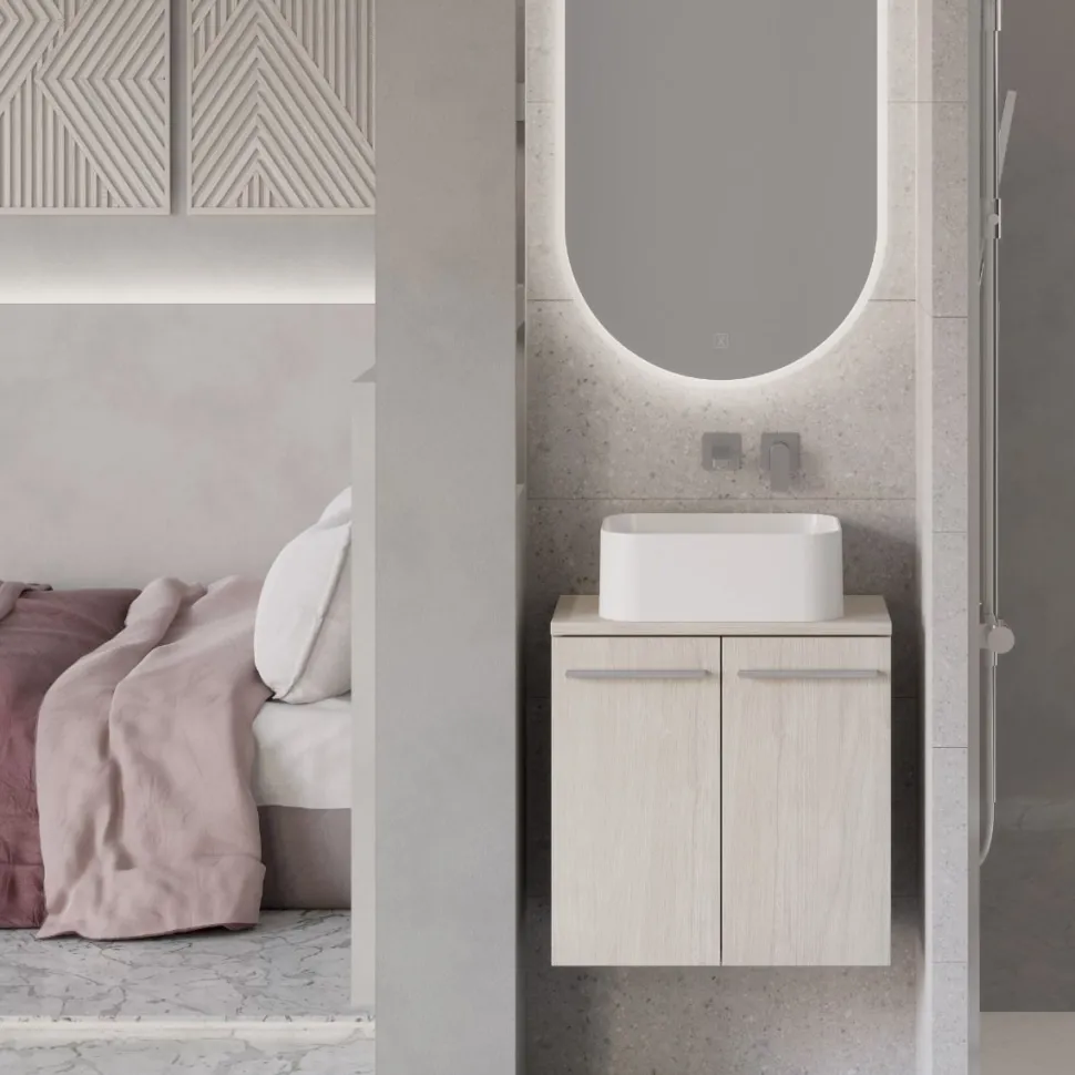 Specchio ovale reversibile con sabbiatura perimetrale retroilluminata
