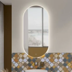 Specchio ovale reversibile con sabbiatura perimetrale retroilluminata