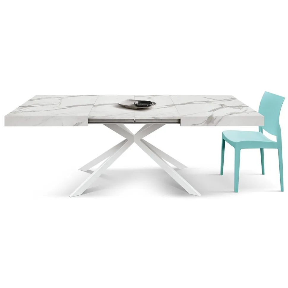 Tavolo allungabile con base a stella in metallo e piano in nobilitato Marmo Bianco Statuario