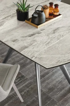 Tavolo allungabile con piano girevole in gres Vortice disponibile in diversi colori L 130