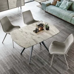 Tavolo allungabile con piano girevole in gres Vortice disponibile in diversi colori L 130