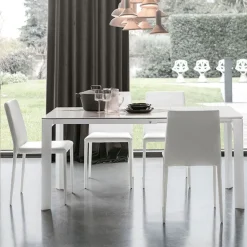 Tavolo allungabile rettangolare in gres porcellanato Saturno in finitura Bianco e Carrara L 110