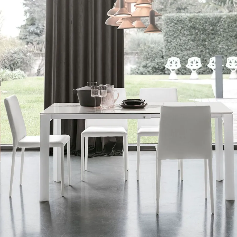 Tavolo allungabile rettangolare in gres porcellanato Saturno in finitura Bianco e Carrara L 110