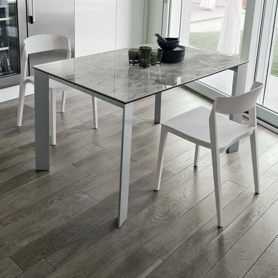 Tavolo allungabile rettangolare con piano in Gres Saturno finitura Arabescato L 130