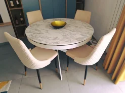 Tavolo rotondo allungabile con struttura in metallo e piano opaco in ceramica Abbraccio