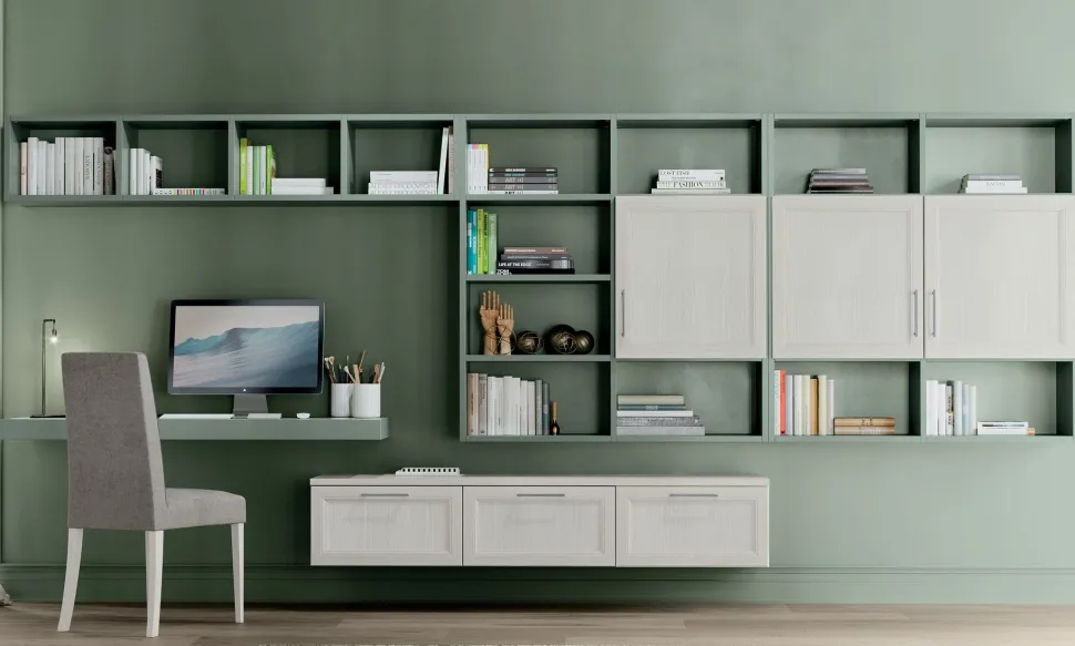 Zona studio attrezzata moderna con scrivania sospesa linea Omega disponibile in vari colori
