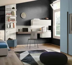 Zona studio moderna con scrivania sospesa finitura Argilla e Noce moro disponibile in vari colori